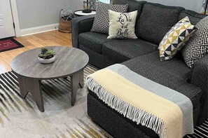 Living area - Stylish 2BR Uptown home with patio & parking. Near Superdome, streetcar, WWII Museum & French Quarter. (New Orleans)