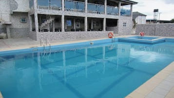 Family Room, Balcony, City View | Pool