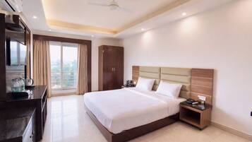 Premium bedding, desk, laptop workspace, soundproofing