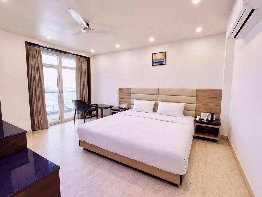Premium bedding, desk, laptop workspace, soundproofing