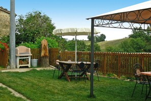 Deluxe appartement, 3 slaapkamers | Buiten dineren