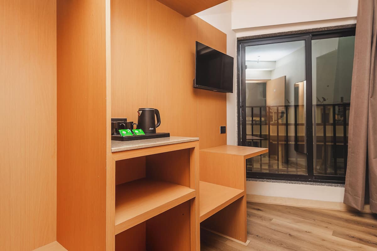 Habitación triple Deluxe | Interior