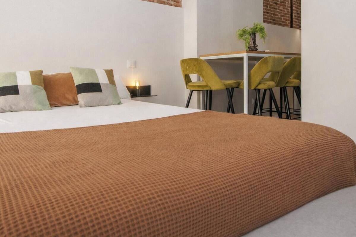 Studio – deluxe, terrasse, tårn | Dundyner, wi-fi (inkludert) og sengetøy