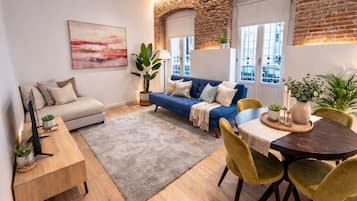 Familie appartement | Woonruimte | Een flatscreentelevisie