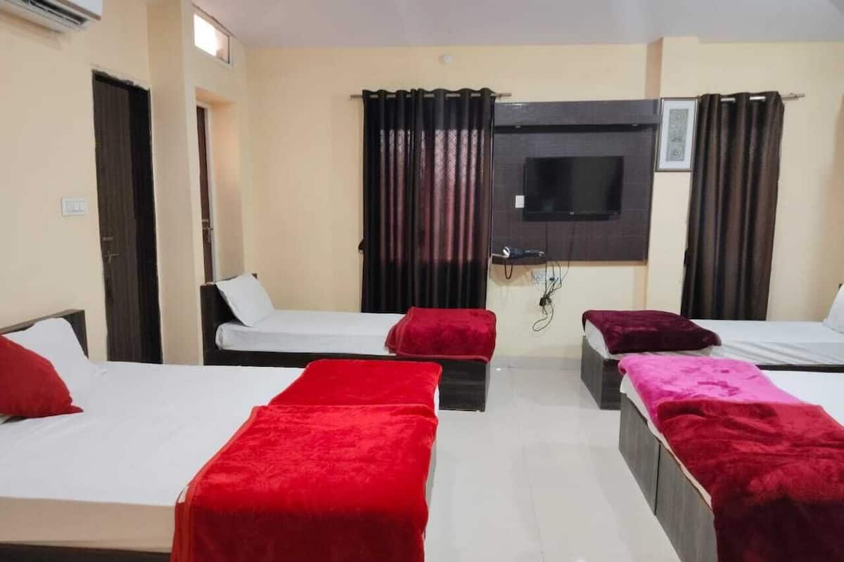 Neljän hengen deluxe-huone