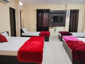 Neljän hengen deluxe-huone