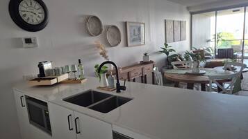 Appartamento Deluxe, vista fiume | Cucina privata | Seggiolone