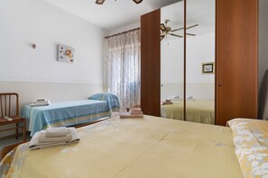Iron/ironing board, bed sheets - Holiday Home 'Lido Conchiglie' with Balcony and Air Conditioning (Conchiglie-Alto Lido)