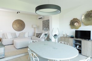 Apartment, 2 Bedrooms, Sea View | Living area - Casa del Faro by Wonderful Italy (Arzachena)
