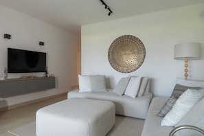 Apartment, 2 Bedrooms, Sea View | Living area - Casa del Faro by Wonderful Italy (Arzachena)