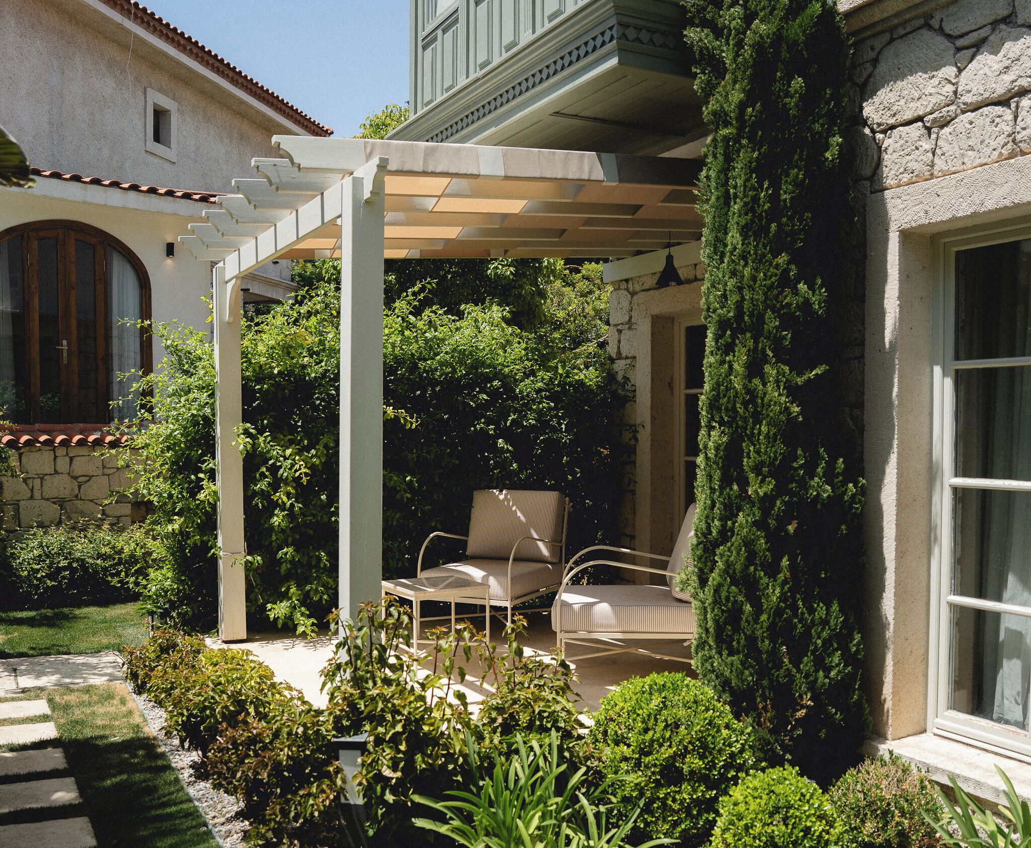 Deluxe Room, Pool View, Garden Area | Terrace/patio