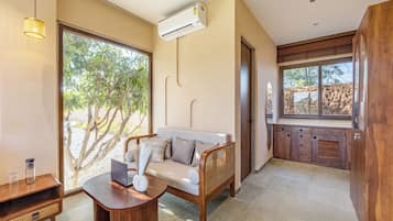 Luxury Villa, Balcony, Courtyard View | Living area | Flat-screen TV