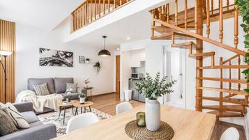Superior Apartment, City View | Living area | 32-inch flat-screen TV with satellite channels