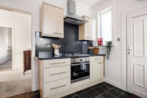 Cookware/dishes/utensils - Coorie Doon, Largs, spacious 2 bedroom apartment (North Ayrshire Council)