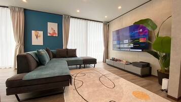 Deluxe Villa, Garden View | Living area