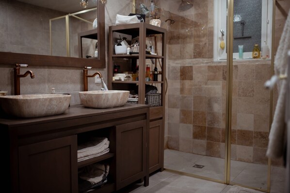 Shower, hair dryer, towels, soap