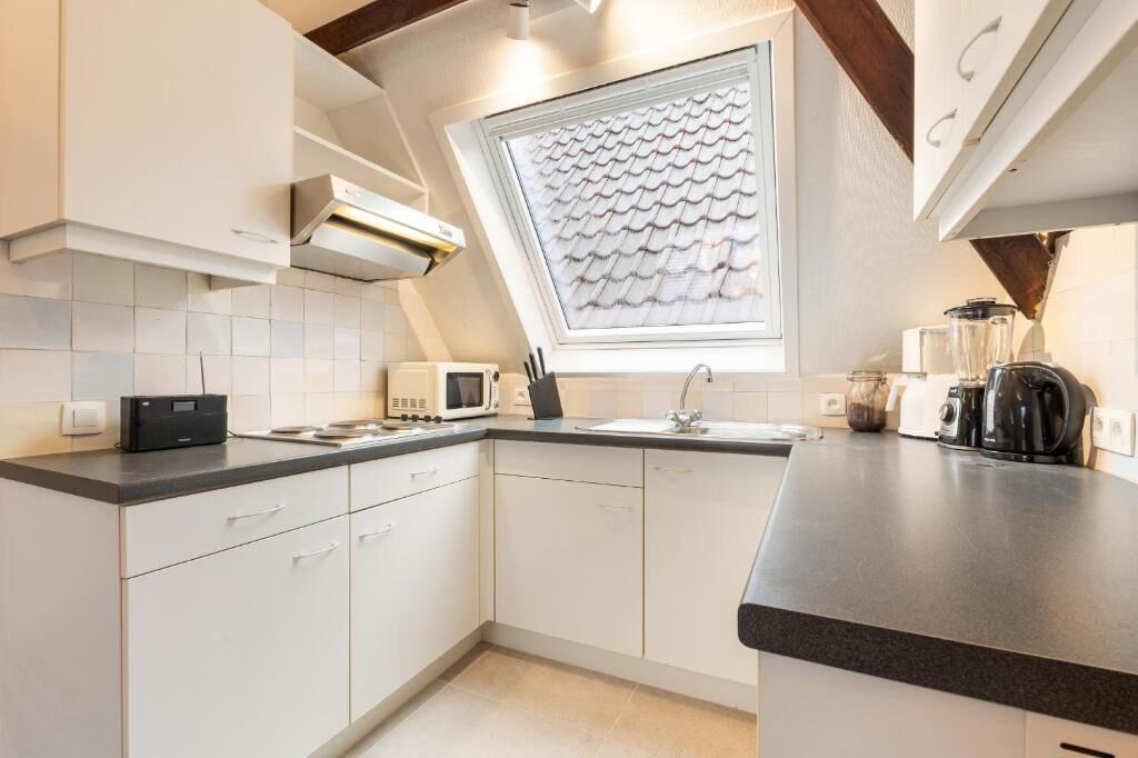 Loft, vista a la ciudad | Cocina privada