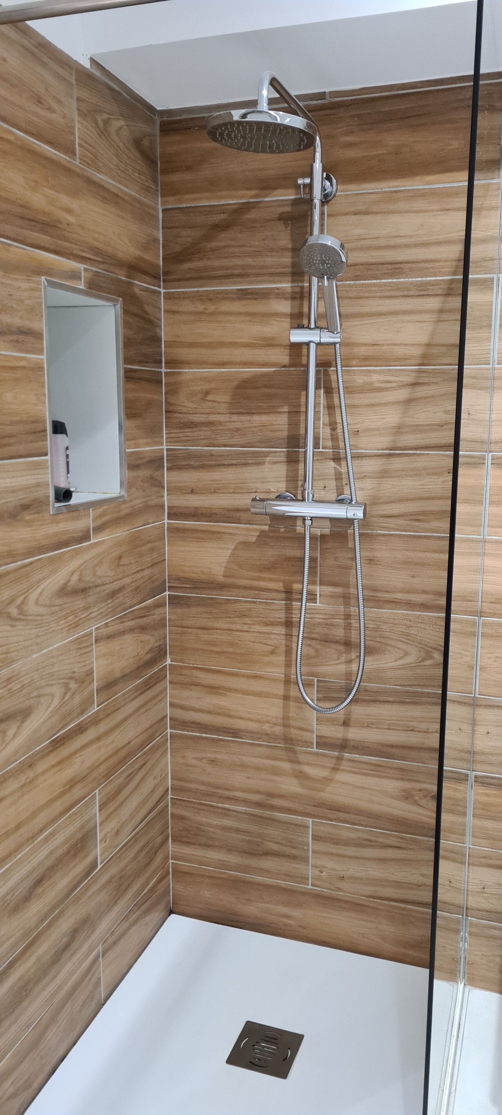 Shower, hair dryer, towels, toilet paper