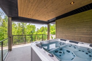 Outdoor spa tub - Vrbo Property (Petite-Rivière)