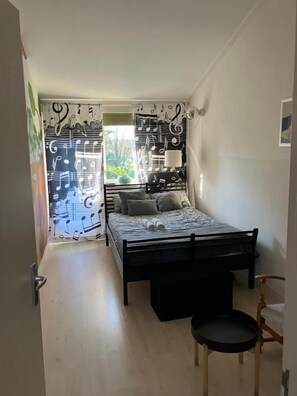 Dubbelrum - utsikt mot trädgården