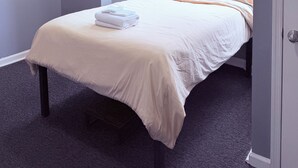 A bedroom with a bed, a window, and a door. - Lovely 4 Bedrooms Family home, 20 minutes from Downtown. (Baltimore)