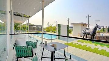 Deluxe Villa, Balcony | Outdoor dining