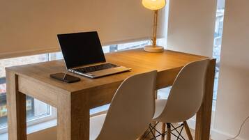 In-room safe, desk, laptop workspace, iron/ironing board