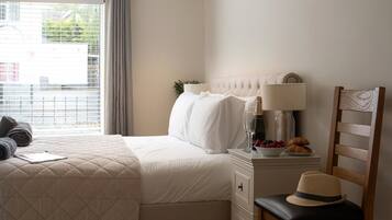 8 habitaciones, tabla de planchar con plancha, wifi y ropa de cama