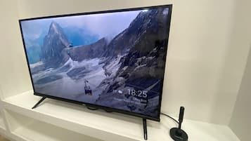 Apartamento conforto, sacada, vista para a praia | TV