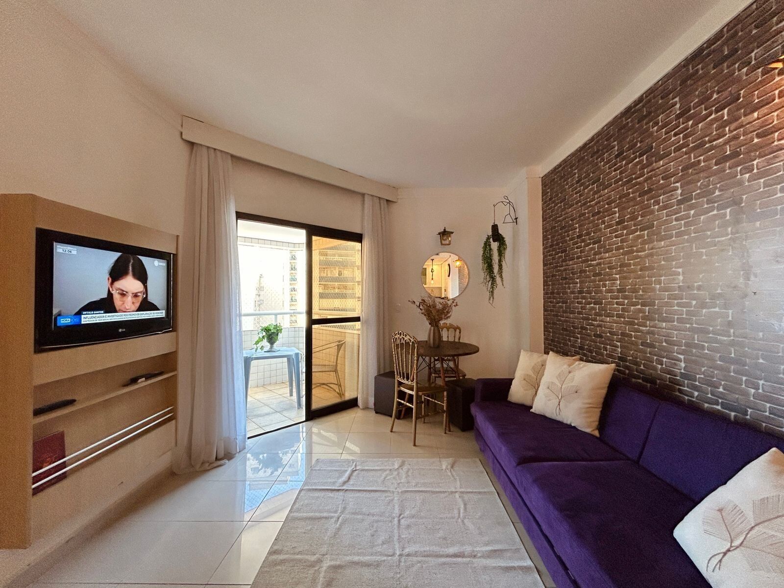 Comfort Apartment | Living area | Flat-screen TV