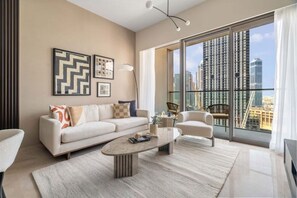 Apartment, Balcony, City View | Living area - Luxurious 1BR at Grande Downtown (Dubai)