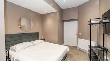 Apartment | Desk, laptop workspace, blackout curtains, iron/ironing board