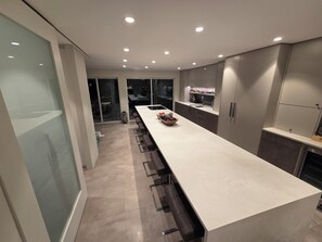 Dining - Modern home on a corner lot with large lawn area and patio with hot tub. (Vancouver)