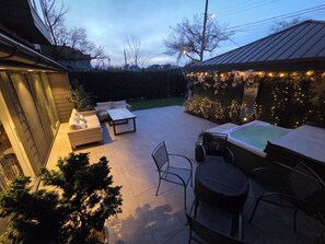 Terrace/patio - Modern home on a corner lot with large lawn area and patio with hot tub. (Vancouver)
