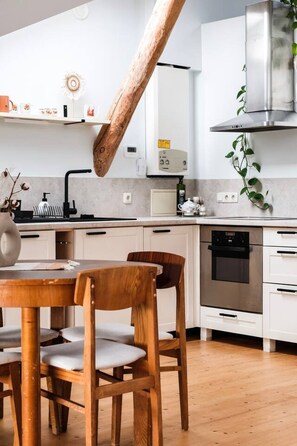 Fridge, oven, stovetop, cookware/dishes/utensils - White Loft Bright Attic Living in the City Center (Riga)