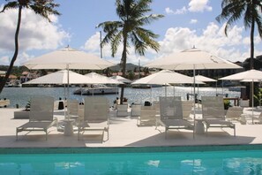 Outdoor pool, pool umbrellas, sun loungers