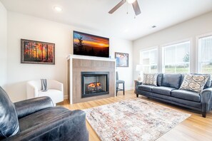 TV, fireplace, table football - Modern 3BD Home Near TOWN! Hot Tub + Games + VIEWS (Sevierville)