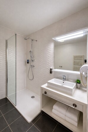 Hair dryer, towels, soap, shampoo