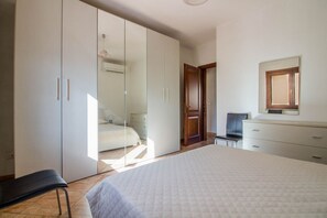 Iron/ironing board - GuestHost - A bright and welcoming 68 square meters apartment, perfect for four people, with a private entrance on the ground floor.The property is located in a quiet area of ​​Olbia and is close to all the main amenities, including restaurants, bars (Olbia)
