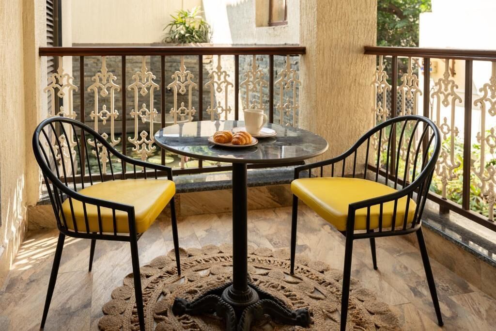 Junior Suite, Balcony, Pool View | Outdoor dining