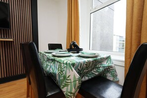 Dining - Contractor Stay • Deck • TVs in Every Room (Swansea)