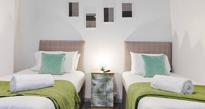 Work-Ready Stay • Central • Parking & Smart TVs