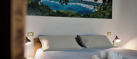 2 habitaciones, tabla de planchar con plancha, internet y ropa de cama