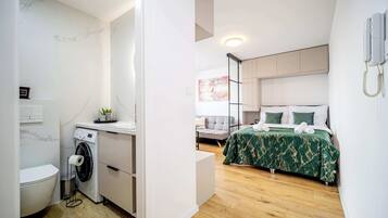 Shower, hair dryer, towels
