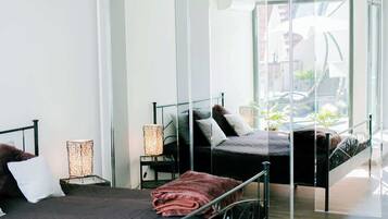 Iron/ironing board, travel crib, WiFi, bed sheets