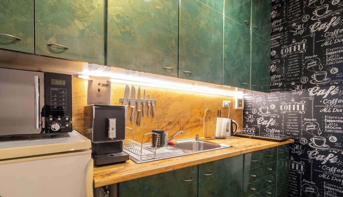 Fridge, microwave, stovetop, coffee/tea maker