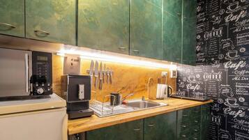 Fridge, microwave, stovetop, coffee/tea maker