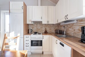 Cabane Confort, balcon, vue cour intérieure | Cuisine privée
