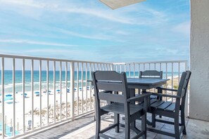 Outdoor dining - Beach Front, Corner Unit, Pool, Sleeps 8, 2 BD/2BA (Gulf Shores)
