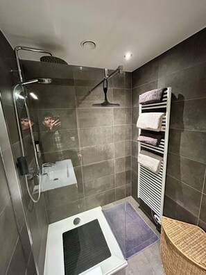 Shower, hair dryer, towels, soap